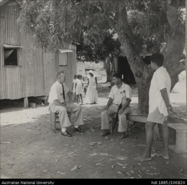 Officer speaking workers