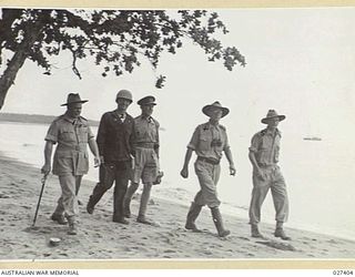 WANIGELA, NEW GUINEA. 1942-10. VISIT OF GENERAL SIR THOMAS BLAMEY, GBE KCB CMG DSO ED, COMMANDING ALLIED LAND FORCES, SOUTH WEST PACIFIC AREA, TO WANIGELA. LEFT TO RIGHT:- GENERAL BLAMEY, ..