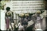 Group of people outside a house