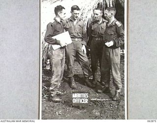 RAMU VALLEY, NEW GUINEA. 1944-01-15. MEMBERS OF THE STAFF OF THE AMENITIES SECTION, 15TH INFANTRY BRIGADE. LEFT TO RIGHT: VX31950 LIEUTENANT D. M. WHITE, AMENITIES OFFICER; VX111856 SERGEANT I. W. ..