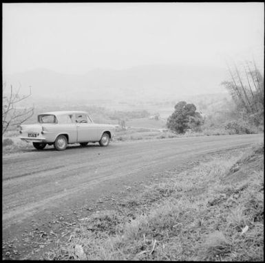 Car parked at the side of a dirt road near Matawailevu, Fiji, 1966 / Michael Terry