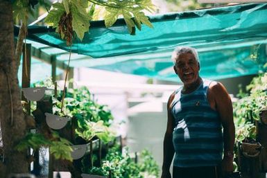 Man with keyhole garden, Atafu, Tokelau