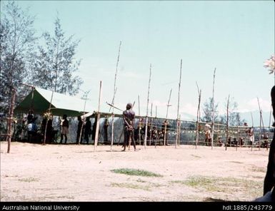 People lined up under tents to vote