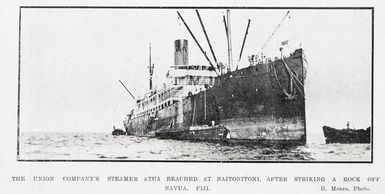 The Union Company's steamer Atua beached at Naitonitoni, after striking a rock off Navua, Fiji