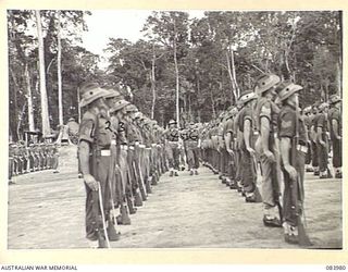 TOROKINA, BOUGAINVILLE, SOLOMON ISLANDS. 1944-12-15. MAJOR GENERAL BRIDGEFORD, GENERAL OFFICER COMMANDING 3 DIVISION, (5), ACCOMPANIED BY CAPTAIN E.F. HARKINS, (4), AND LIEUTENANT D.G. WRIGHT, (6), ..