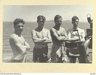 AT SEA. 1944-10-22. THE BRITISH BOFORS GUN CREW ABOARD THE SS TAROONA, DURING THE MOVEMENT OF TROOPS TO NEW GUINEA. IDENTIFIED PERSONNEL ARE:- GUNNER T. MACDERMOTT (1); BOMBARDIER I. SMITH (2); ..