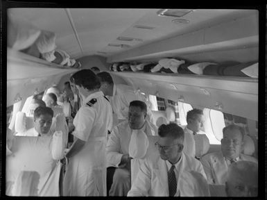 Hon Tupua Tamasese Mea'ole and other passengers on board aircraft, TEAL (Tasman Empire Airways Limited), Satapuala, Upolu, Samoa