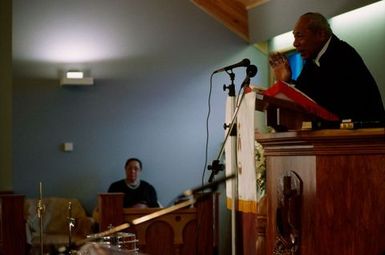 King Taufa'ahau Tupou IV speaking from the pulpit at the dedication of Vaine Mo'onia (The True Vine) church