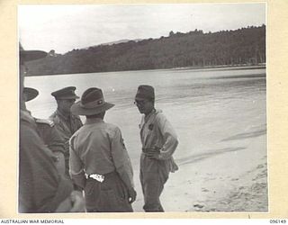 MUSCHU ISLAND, NEW GUINEA. 1945-09-10. COLONEL N.H. SAXBY, ASSISTANT DIRECTOR OF MEDICAL SERVICES 6 DIVISION, DISCUSSING THE MATTER OF MEDICAL SUPPLIES WITH THE JAPANESE MEDICAL OFFICER OF THE ..