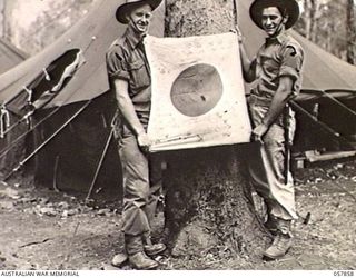 WONDECLA, QLD. 1943-10-07. VX58653 LANCE CORPORAL H. C. CRANSTON (LEFT) AND NX88824 PRIVATE P. HALL, BOTH OF "D" COMPANY, 2/5TH AUSTRALIAN INFANTRY BATTALION, 17TH AUSTRALIAN INFANTRY BRIGADE ..