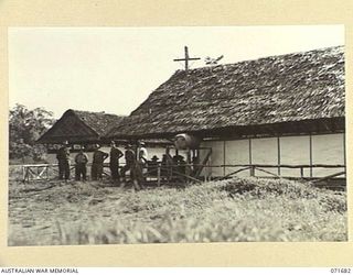LAE, NEW GUINEA. 1944-03-25. TROOPS ON SICK PARADE OUTSIDE THE REGIMENTAL AID POST AND DENTAL CENTRE AT HEADQUARTERS LAE BASE SUB AREA