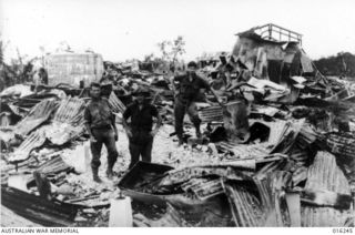 Sattelberg, New Guinea. November 1943. The battered remains of the village in ruins after bombing. Air attacks and artillery onslaughts preceded the final attack and capture of the village by ..