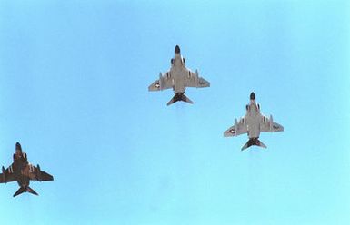 F-4 Phantom II aircraft from the Hawaii Air National Guard fly in a missing man formation to honor the Unknown Serviceman of the Vietnam Era. The serviceman's casket is being placed aboard the frigate USS BREWTON (FF-1086) for transport to Alameda, Calif. It will then be transferred to Arlington National Cemetery for interment in the Tomb of the Unknowns