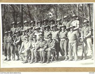 HERBERTON, QLD. 1943-07-09. ADMINISTRATION STAFF OF HEADQUARTERS, AUSTRALIAN ARMY SERVICE CORPS, 6TH AUSTRALIAN DIVISION. SHOWN ARE, 1 - 26:- NX134751 CAPTAIN G.N. FISHER; NX196 CAPTAIN W.L. DAY; ..