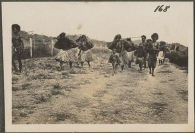 Port Moresby women wearing grass skirts, Papua New Guinea, probably 1916