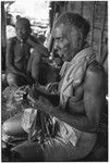 Folofo'u performing divination with cordyline leaves