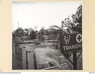 CAPE WOM, NEW GUINEA. 1945-09-27. THE GARDEN ENTRANCE TO THE ADMINISTRATIVE OFFICES, 2/7 FIELD AMBULANCE