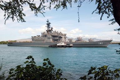 The Japanese Maritime Self-Defense Force (MSDF) Japanese Defense Ship (JDS) Haruna Class Destroyer Haruna (DDH 141) passes Hospital Point in Pearl Harbor, Hawaii, during arrival honors prior to the multinational maritime exercise Rim of the Pacific 2004 (RIMPAC). RIMPAC is the largest international maritime exercise in the waters around the Hawaiian Islands. This years exercise will include eight participating nations; Australia, Canada, Chile, Japan, Peru, South Korea, Britain and the United States. RIMPAC is intended to enhance the tactical proficiency of participating units in a wide array of combined operations at sea, while enhancing stability in the Pacific Rim region