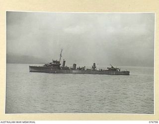 JACQUINOT BAY, NEW BRITAIN. 1944-11-04. THE RAN DESTROYER HMAS VENDETTA AT ANCHOR IN THE BAY AFTER ESCORTING THE TROOPSHIP CAPE ALEXANDER INTO THE AREA