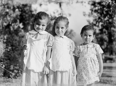 [Portrait of three young girls]