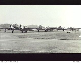 PORT MORESBY, PNG. 1964-08-02. DOUGLAS C47 DAKOTA TRANSPORT AIRCRAFT OF SCHOOL OF NAVIGATION RAAF EAST SALE, VIC, SHORTLY AFTER ARRIVAL AT JACKSON'S FIELD FOLLOWING A NAVIGATION EXERCISE FROM EAST ..