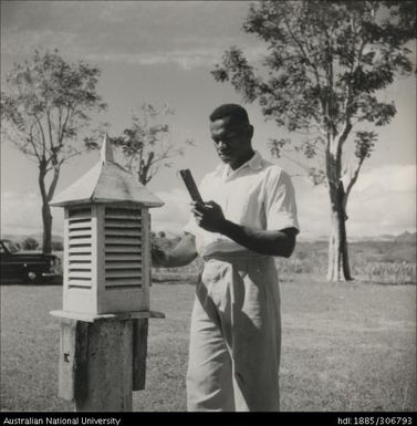 Officer checking gauge