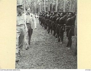 MILNE BAY, NEW GUINEA. 1944-04-20. THE HONOURABLE E.J. WARD, MINISTER FOR EXTERNAL TERRITORIES IN THE AUSTRALIAN GOVERNMENT (2), ACCOMPANIED BY WX40 BRIGADIER D.M. CLELAND, MBE, DEPUTY ADJUTANT & ..