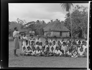Children being organised into rows for the meke, Vuda village, Fiji