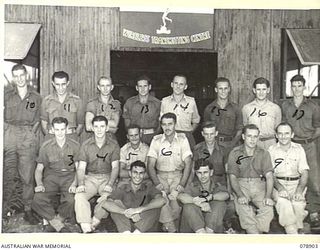 LAE AREA, NEW GUINEA. 1945-02-06. PERSONNEL OF THE MAIN WIRELESS TRANSMITTING CENTRE OF THE CORPS OF SIGNALS, HEADQUARTERS, FIRST AUSTRALIAN ARMY. FOR IDENTIFICATION OF 17 PERSONNEL SEE FILE