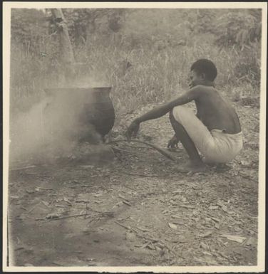 Asavia watching the cooking pot, Rabaul, New Guinea, ca. 1929 / Sarah Chinnery