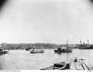 NEW GUINEA, 1943-07-21. THIRD (LAST) SHOT OF A PANORAMA OF ORO BAY (JOINS 054581 AND 054582). NOTE MISCELLANY OF SMALL CRAFT USED IN THESE WATERS
