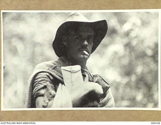 Canning's Saddle, New Guinea. QX40335 Private Clarence Alfred Bishop of D Company, 2/12th Battalion who was wounded in action on Mount Prothero