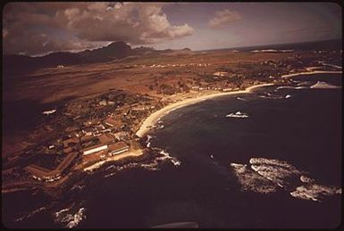 THE POIPU BEACH AREA HAS THE MOST DESIRABLE OCEAN FRONTAGE ON THE ISLAND, AND HOTELS ARE RAPIDLY TAKING OVER THE REMAINING BEACH LAND. BECAUSE DRY CLIMATE DISQUALIFIES IT FOR PRIME AGRICULTURE, THE LAND USE COMMISSION ZONED THE AREA FOR URBAN USE HOWEVER, IT IS FOR THE COUNTY TO DECIDE HOW FAR URBANIZATION WILL BE CARRIED. THE "POIPU COMMUNITY ASSOCIATION," A PRIVATE GROUP, IS ACTING TO CURB INDISCRIMINATE DEVELOPMENT