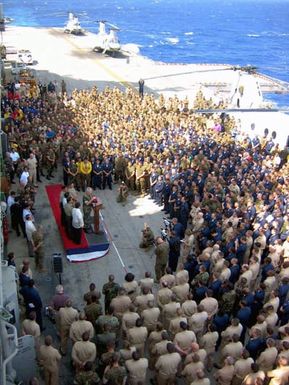 US Navy (USN) Admiral (ADM) William J. Fallon, Commander, US Pacific Command (USPACOM), visits the crew of the USN Tarawa Class Amphibious Assault Ship, USS SAIPAN (LHA 2). During his visit ADM Fallon thanked crew members for their efforts in providing humanitarian assistance and disaster relief aid to victims of a devastating mud and landslide that struck the Philippine Island of Leyte