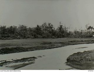 MADANG, NEW GUINEA. 1944-07-20. THE AUSTRALIAN COMFORTS FUND STORE. IN THIS LOCALITY QX1071 CORPORAL J. A. FRANCH VC, 2/9TH INFANTRY BATTALION, WON HIS POSTHUMOUS AWARD. THIS IMAGE JOINS NO. 074700