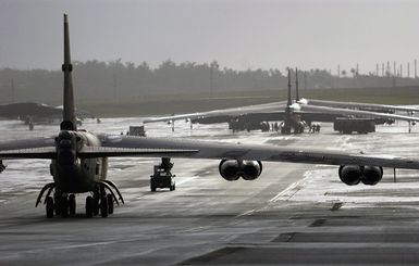 The first of six US Air Force (USAF) B-52 Stratofortress bombers from Minot Air Force Base (AFB), North Dakota (ND) taxis to their parking spaces after landing at Andersen Air Force Base (AFB), Guam (GU) in support of the US Pacific Command's (PACOM) request for a rotational bomber force