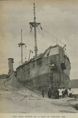 Ship half buried by a rain of volcanic ash