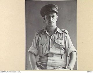 LAE, NEW GUINEA. 1945-10-04. LIEUTENANT COLONEL J.A. PRETTY, ASSISTANT QUARTERMASTER GENERAL (MEDICAL), HEADQUARTERS FIRST ARMY