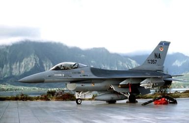 A left side view of an F-16 Fighting Falcon aircraft being readied for a mission during exercise COPE ELITE '81. The Falcon, armed with a 500-pound Mark 82 laser-guided bomb, is from the 428th Tactical Fighter Squadron, 474th Tactical Fighter Wing