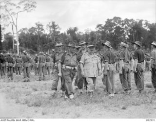 BOUGAINVILLE. 1945-06-08. GENERAL SIR THOMAS A. BLAMEY, COMMANDER-IN-CHIEF, ALLIED LAND FORCES, SOUTH WEST PACIFIC AREA (5), WITH A GROUP OF SENIOR OFFICERS INSPECTING TROOPS OF 7 INFANTRY BRIGADE, ..