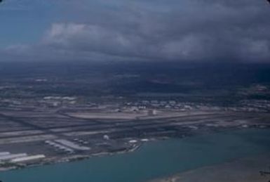 [Aerial view of coastline and airport in Oahu, United States]