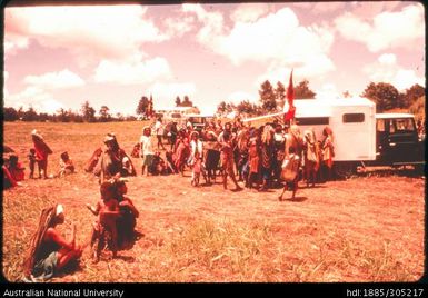 People gathered near vehicle