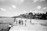 Guam, children standing along waterfront