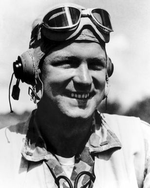 World War II (WWII) area photograph of US Marine Corps (USMC) First Lieutenant (1LT) Robert M. Hanson, Marine Fighter Squadron 215 (VMF-215) "Flying Corsairs" taken at Bougainville, January 28,1944. 1LT Hanson was awarded the Medal of Honor and is an Ace Pilot credited with 25 kills. His home is 31 Brooks Avenue, Newtonville, Massachusetts