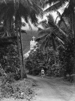 [View of a church through Palm trees]