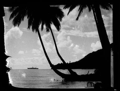 [Silhouette of Palm trees, an island, and a ship at sea]