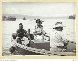 JACQUINOT BAY, NEW BRITAIN. 1945-03-11. THE OFFICIAL LAUNCH AT THE AQUATIC CARNIVAL OF THE NEW BRITAIN YACHT CLUB, 5TH BASE SUB AREA. IDENTIFIED PERSONNEL ARE: VB171693 LIEUTENANT-COLONEL F.L. ..