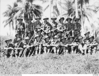 MADANG, NEW GUINEA. 1944-06-30. PERSONNEL OF NO.8 PLATOON, A COMPANY, 24TH INFANTRY BATTALION. IDENTIFIED PERSONNEL ARE:- NX143683 PRIVATE R.S. KERR (1); V260557 PRIVATE A.S. SCHULTZ (2); TX16074 ..