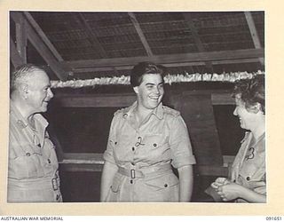 LAE, NEW GUINEA. 1945-05-11. GENERAL SIR THOMAS A. BLAMEY, COMMANDER-IN-CHIEF, ALLIED LAND FORCES, SOUTH WEST PACIFIC AREA (1), TALKING WITH CAPTAIN M.W. HORNSBY, COMMANDANT AUSTRALIAN WOMEN'S ARMY ..