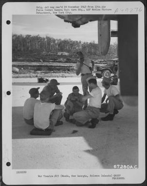 After A Mission Flown By Consolidated B-24 "Liberators" Of The 72Nd Bomb Squadron, 5Th Bomb Group, Capt. Lord And Capt. Adams Are Interviewed By Fred Hanson, Associated Press Correspondent, At Their Base On Munda, New Georgia, Solomon Islands. The Crew Of (U.S. Air Force Number 67280AC)